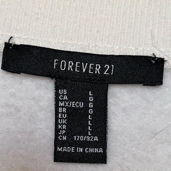 Cream ruffle sweater - Picture 2 of 3